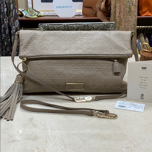 ANYA HINDMARCH LEATHER SIGNATURE EMBOSSED BOWS CROSSBODY BAG IN TAUPE - Picture 5 of 14